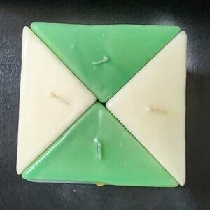 Escentials Green & white Candle on   glass trivet 4 separate Candles Light scent